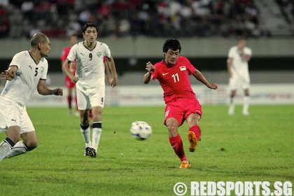 National footballer Qiu Li gets tackled from behind by new FIFA ...