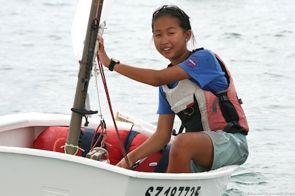 Sailors Kimberly Lim and Andrew Tan in the medals at NZ Optimist ...