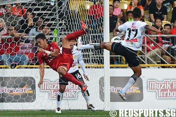 Shahfiq Ghani (LionsXII #26) attempts a shot at goal in the first half. The 20-year-old created both goals in his debut for the LionsXII.