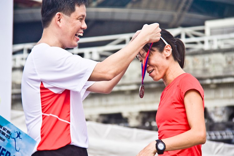 Stella Lee 2nd runner up 21k AHM Family Womens receives her medal