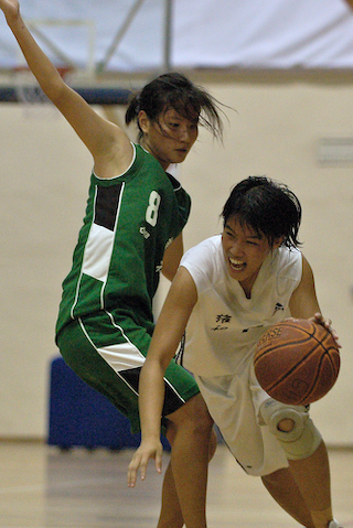 Yin Ling of VJC drives against RJC’s Clara Tan (green, #8). (Photo ...
