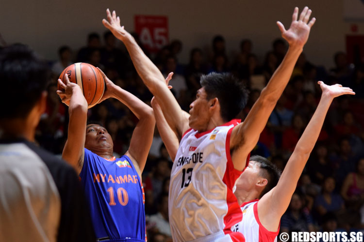 Khaw Yeong Wooi (SIN #13) defends against Tun Zar Ni (MYA #10). (Photo 5 © Laura Lee/Red Sports)