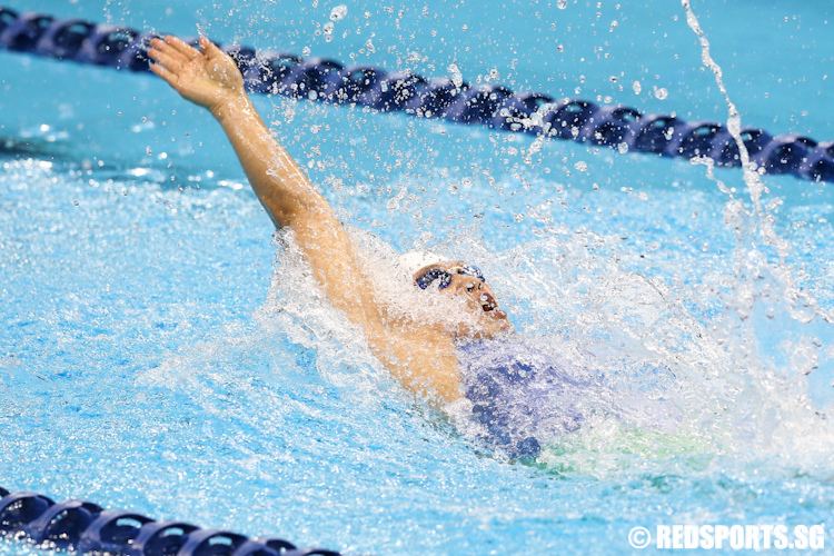 Tao Li of Singapore in action during the women's 100m backstroke final. She won the gold medal with a time of 1 minute and 2.67 seconds. (Photo © Lee Jian Wei/Red Sports)