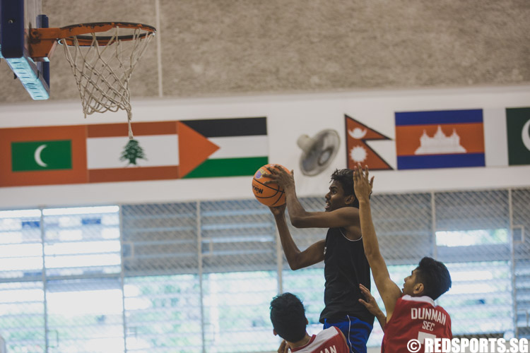 Vignesh Rengarajan of SKC in action during the U-17 boys' 3 x 3 basketball competition of the Singapore Youth Olympic Festival. (Photo 28 © Soh Jun Wei/Red Sports)