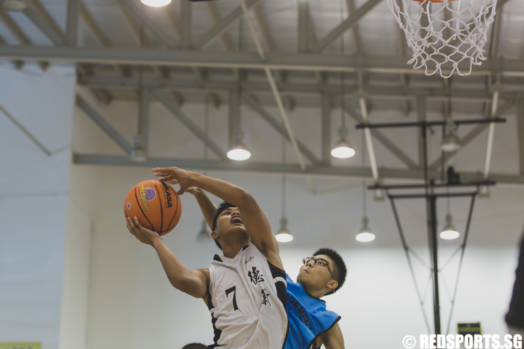 Cheng Ye Hui of Dream Team draws the foul on the lay-up during the U-15 boys' 3 x 3 basketball competition of the Singapore Youth Olympic Festival. (Photo 26 © Soh Jun Wei/Red Sports)