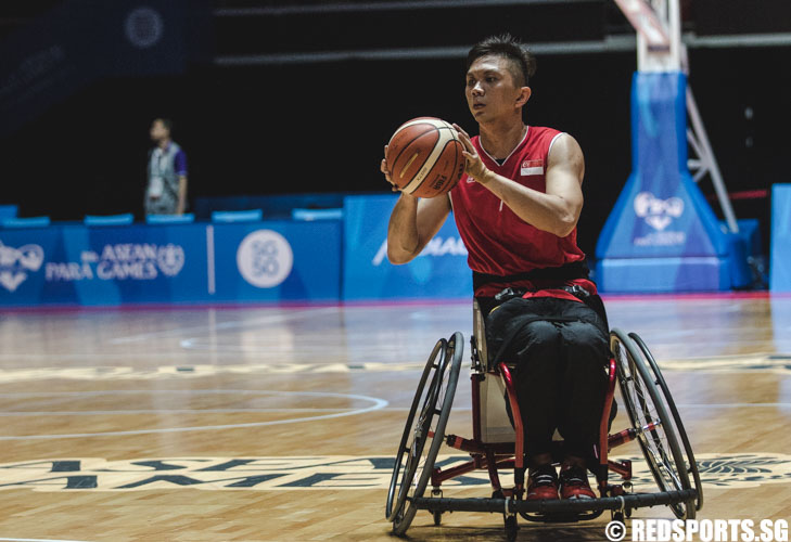 Choo Poh Choon (SIN #7) passes the ball during the match against Thailand at the 8th ASEAN Para Games (Photo 2 © Soh Jun Wei/Red Sports)