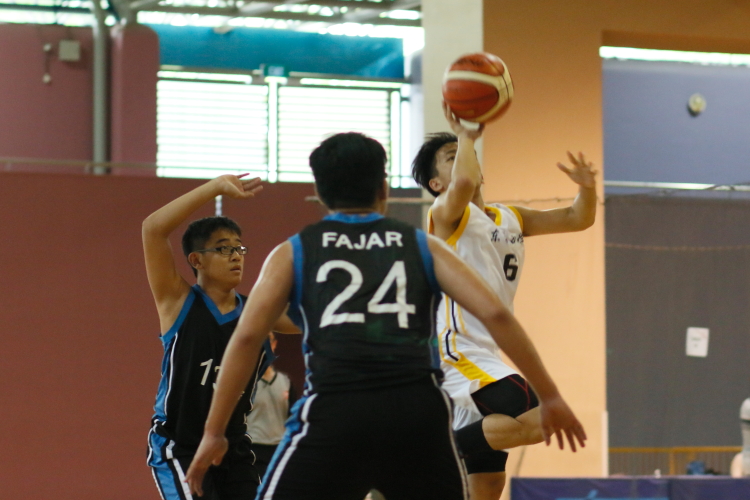 #6 of Tanglin (White) attempting a floater over the Fajar defense. 