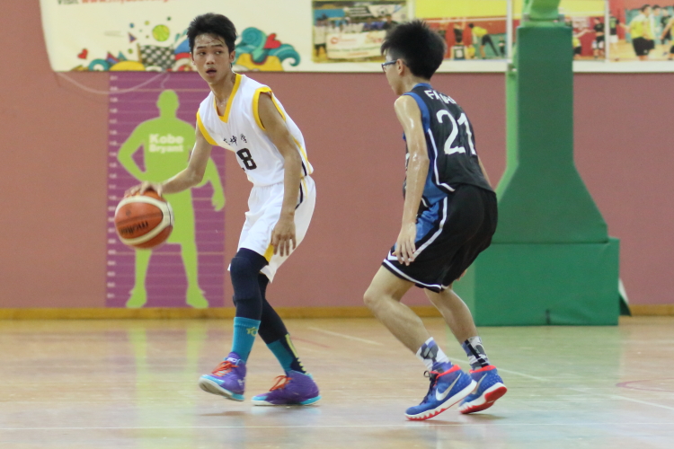 Seet Zhi Yun (Fajar #21) guarding #8 of Tanglin. Seet Zhi Yun scored a  game-high 14 points, including 1 3-pointer.