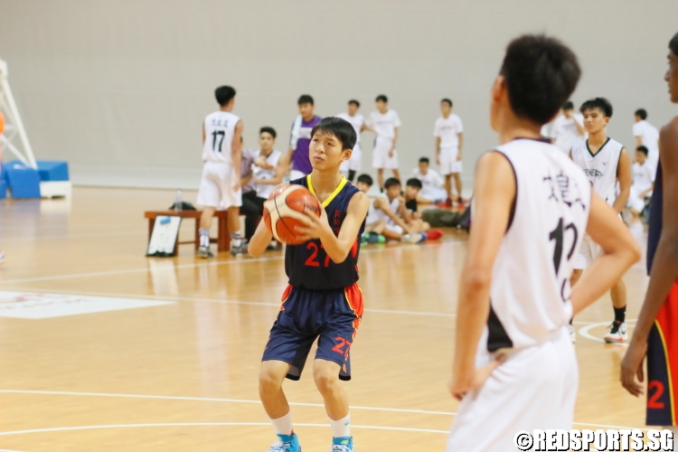 Clifford (ACS (Barker) #27) taking aim as he attempts a free throw. (Photo  © Chan Hua Zheng/Red Sports)