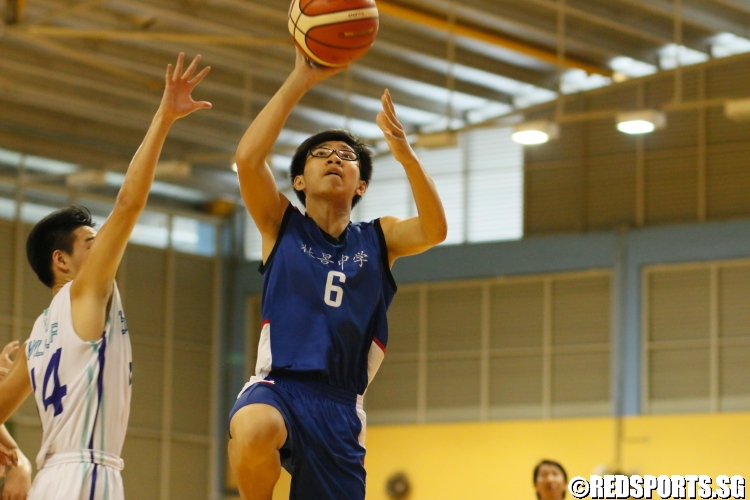 Aw Kai Jie (Woodgrove #6) rises for a floater. (Photo  © Chan Hua Zheng/Red Sports)