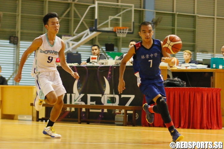 Lacsado Jack William Santiago (Woodgrove #7) slashing to the hoop on a fast break. (Photo  © Chan Hua Zheng/Red Sports)