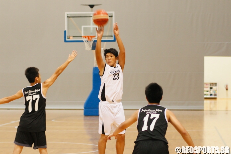 Jacold Ganbold (BM #23) taking a jumpshot over the ACS(I) defense. He had a game-high 12 points in the victory. (Photo  © REDintern Chan Hua Zheng)