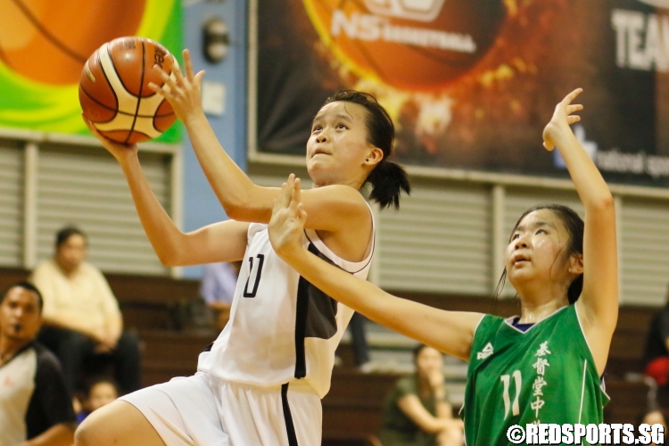 A SCGS player rises for the lay-up. (Photo 5 © Dylan Chua/Red Sports)