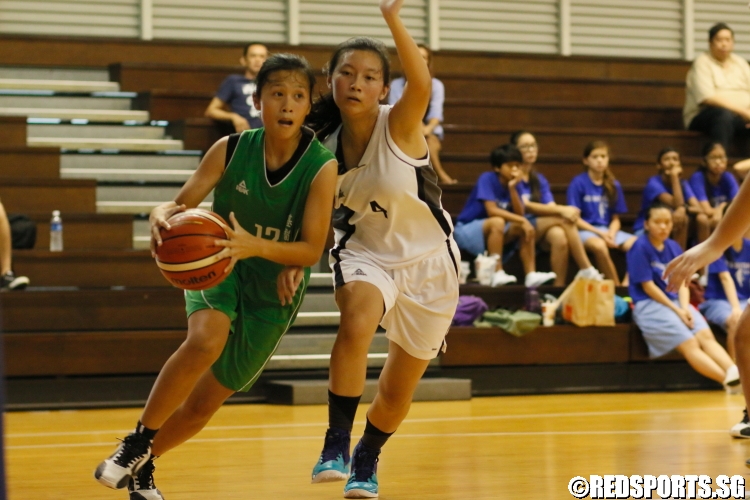 Kau Wen Qi (Christ Church #12) drives strong to the basket. (Photo 16  © Dylan Chua/Red Sports)