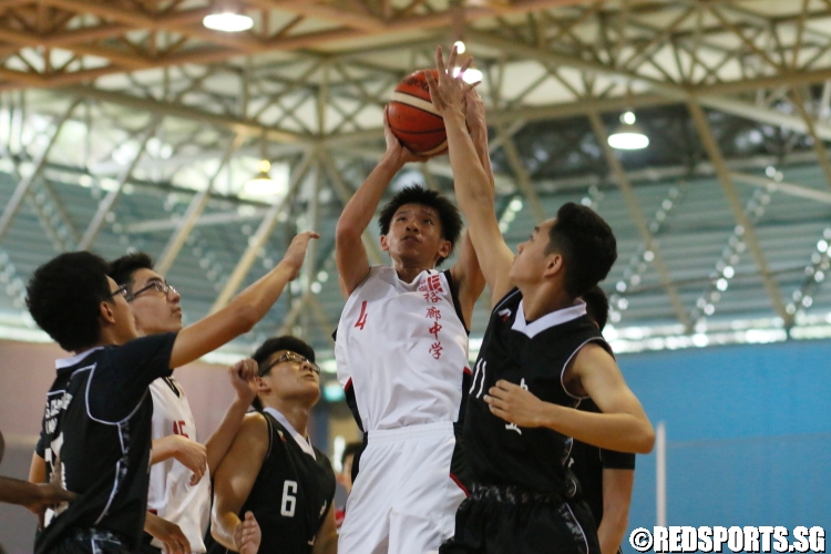 Chua Qi Wei (JSS #4) elevating for a shot. He scored 10 points in the game. (Photo 1 © Dylan Chua/Red Sports)