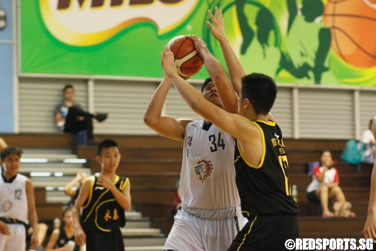 Dorian Chin (NV #34) goes up strong for a shot. He scored a game-high 18 points in the victory. (Photo  © Chan Hua Zheng/Red Sports)