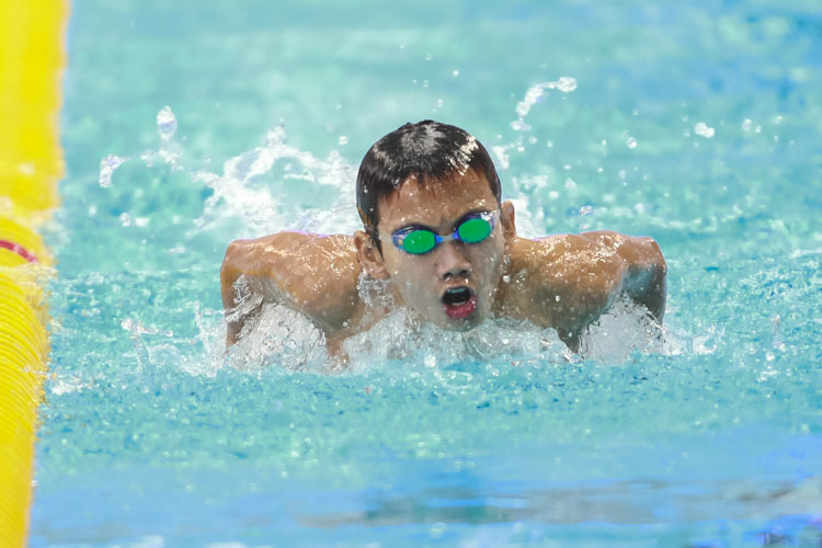 Alan Lo swims in the boys' 8-12 year old 100m butterfly. He finished 3rd in the boys' 12 year old group with a final timing of 1:10.32. (Photo © Soh Jun Wei/Red Sports)