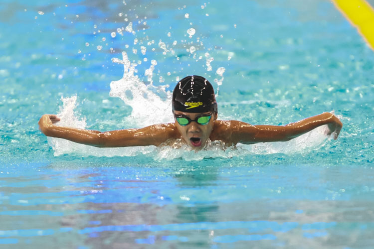 Nathan Lim in action during the boys' 8-12 year old 100m butterfly. He finished first in 9 year olds group with a final timing of 1:24.60. (Photo © Soh Jun Wei/Red Sports)