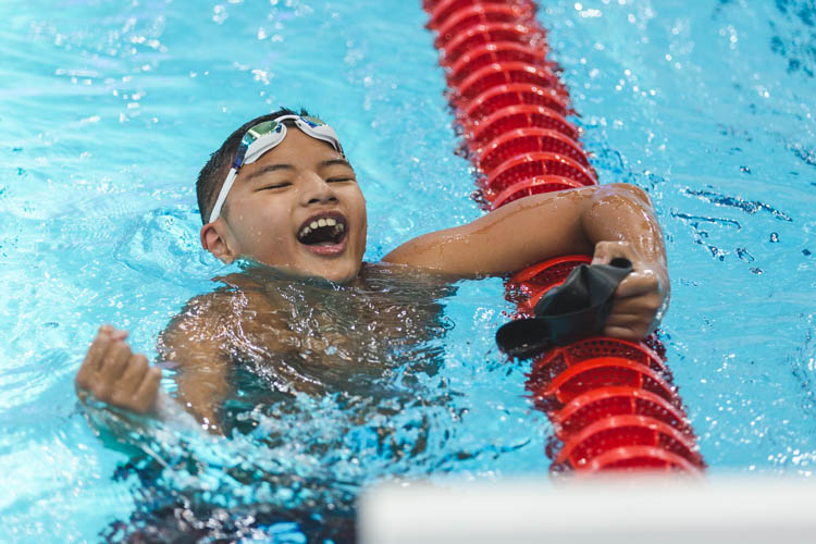 Ephraim Tan celebrating his victory after the 200m butterfly. (Photo © Soh Jun Wei/Red Sports)