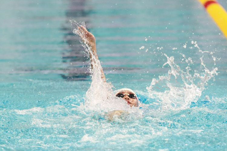 Marc Lim swims in the boys' 8-12 year old 50m backstroke. He won first place in the 10 year old group with a timing of 36.47s. (Photo © Soh Jun Wei/Red Sports