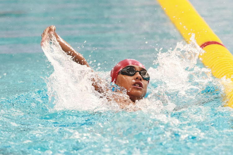 Mateen Shyam swims in the boys' 8-12 year old 50m backstroke. He won first place in the 11 year old group with a timing of 34.78s. (Photo © Soh Jun Wei/Red Sports