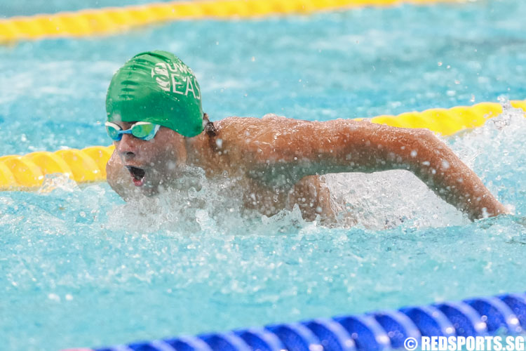 Cedric Bellens swimming in the mens' 13 and over 50m butterfly prelims at the 47th Singapore National Age Group Swimming Championships. (Photo © Soh Jun Wei/Red Sports)