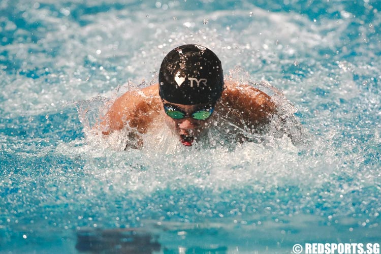 Jonathan Tan in action in the mens' 13 and over 50m butterfly prelims at the 47th Singapore National Age Group Swimming Championships. (Photo © Soh Jun Wei/Red Sports)