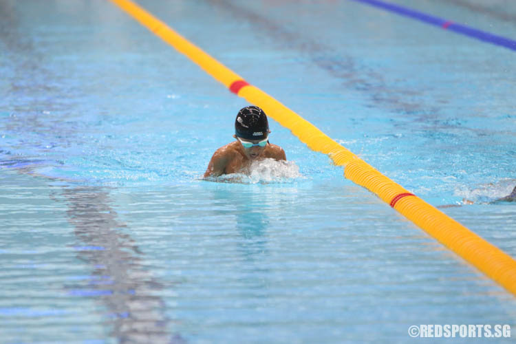 Matthew Ang completing his 100m backstroke event. He finished first among his 9 year old peers with a timing of 1:31.26, breaking the last meet record 1:32.72 set by Brilliant Chua in 2008. (Photo 6 © Chua Kai Yun/Red Sports)