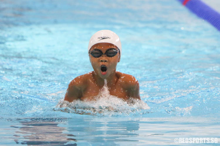 Marcus Choo completing the breaststroke leg during the boys' 200m IM event at the 47th Singapore National Age Group Swimming Championships. He finished first in the 9 year old age group with a timing of 2:50.14, breaking the last meet record 2:55.10 set by Gabriel Koo in 2014. (Photo 1 © Chua Kai Yun/Red Sports)