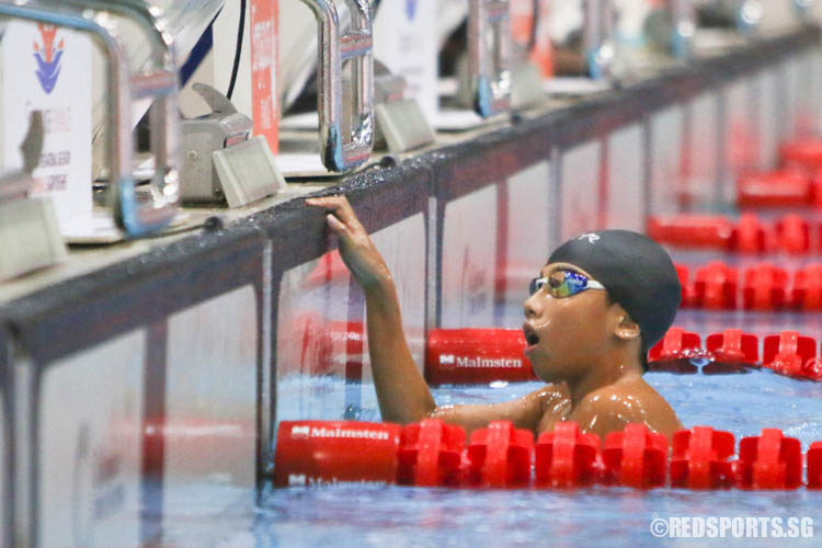 Christian Low reacts after his 400m IM event at the 47th Singapore National Age Group Swimming Championships. He finished second in the 12 Year Old age group with a timing 5:18.45. (Photo 7 © Chua Kai Yun/Red Sports)