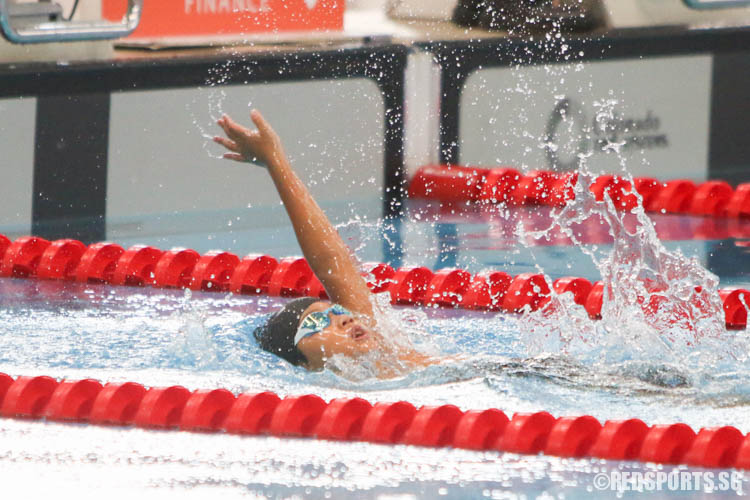 Reagan Cheng completing his 50m backstroke race. He finished first in the 8 year old age group with a timing of 41.92. (Photo 3 © Chua Kai Yun/Red Sports)