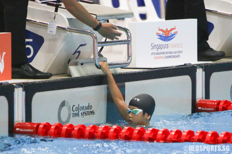 Reagent Cheng reacts after his 50m Freestyle at the 47th Singapore National Age Group Swimming Championships. He finished first in the 8 Year Old 50m Freestyle with a timing 35.14. (Photo 8 © Chua Kai Yun/Red Sports)