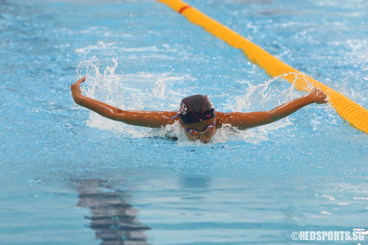 Takahashi Nao in action in the girls' 100m butterfly at the 47th Singapore National Age Group Swimming Championships. She finished fifth in the 12 year old age group with a timing of 1:14.36. (Photo 10 © Chua Kai Yun/Red Sports)