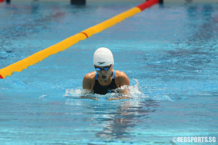 Claresa Liau starting the breaststroke leg during the girls' 200 IM. She finished second among the 12 year olds with a timing of 2:35.09. (Photo 14 © Chua Kai Yun/Red Sports)