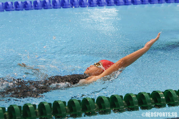 Goh Yu Xin in action during the girls' 50m backstroke event. She finished 7th among the 8 year olds with a timing of 50.13. (Photo 3 © Chua Kai Yun/Red Sports)