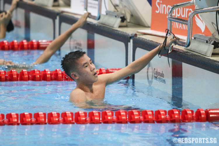 Glen Lim reacts after his 1500m freestyle event. (Photo 11 © Chua Kai Yun/Red Sports)