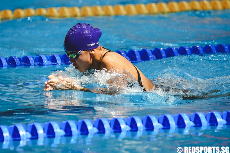 Charity Lien swimming the breaststroke in the women's 13 and over 200m IM prelims at the 47th Singapore National Age Group Swimming Championships. (Photo © Soh Jun Wei/Red Sports)