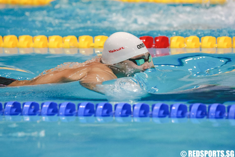 Lionel Khoo surfacing during his 100m breaststroke 15 and over 'A' finals at the 47th Singapore National Age Group Swimming Championships. He finished second in the 18 and over group with a timing of 1:02.26. This bests a 7-year national open record set by Parker Lam in 2009. (Photo © Soh Jun Wei/Red Sports)