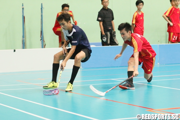 An ACS Barker player finding a way around his opponent.  (Photo 6 © Dylan Chua/Red Sports)