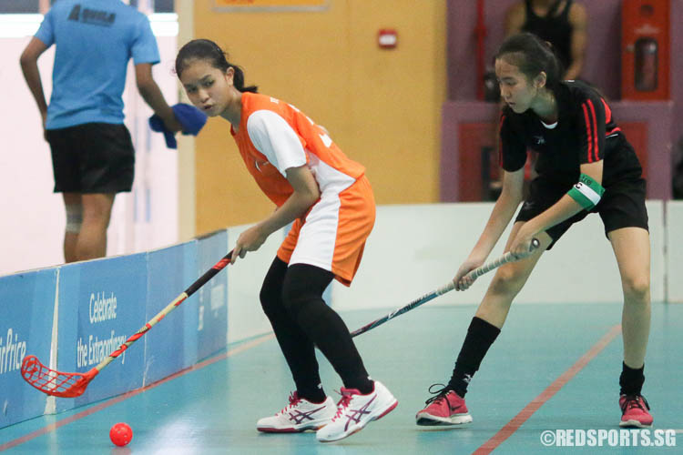 An IJC player looks to pass. (Photo © Chua Kai Yun/Red Sports)