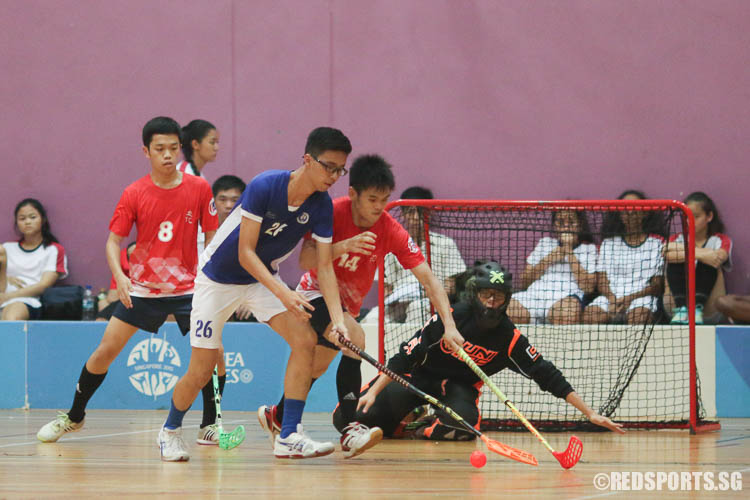 Brandon Ong (MJC #26) controls the ball while Jerrick Sik (RVHS #14) defends. (Photo © Chua Kai Yun/Red Sports)