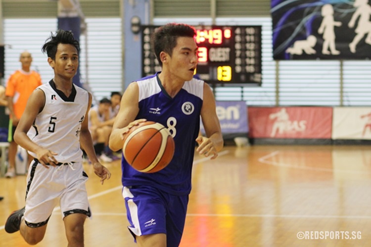 Shaun Lee (MJC #8) wins possession and charges forward. (Photo © Ryan Lim/Red Sports)