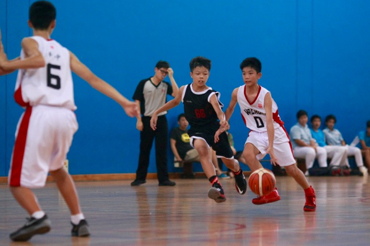 HCI (white) had a comfortable 82-8 win over Zhenghua to improve to a 2-0 win-loss record. (Photo © Les Tan/Red Sports)