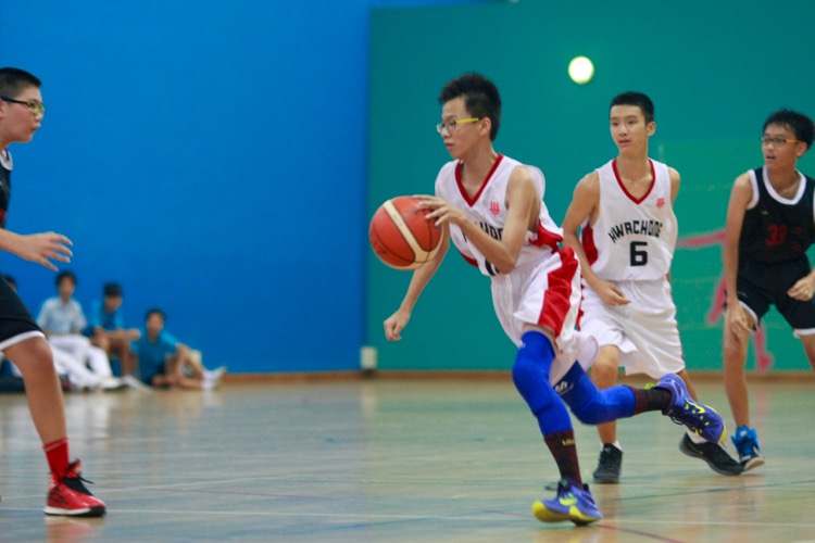 HCI (white) had a comfortable 82-8 win over Zhenghua to improve to a 2-0 win-loss record. (Photo © Les Tan/Red Sports)