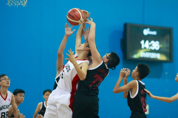 HCI (white) had a comfortable 82-8 win over Zhenghua to improve to a 2-0 win-loss record. (Photo © Les Tan/Red Sports)