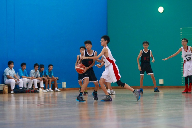 HCI (white) had a comfortable 82-8 win over Zhenghua to improve to a 2-0 win-loss record. (Photo © Les Tan/Red Sports)