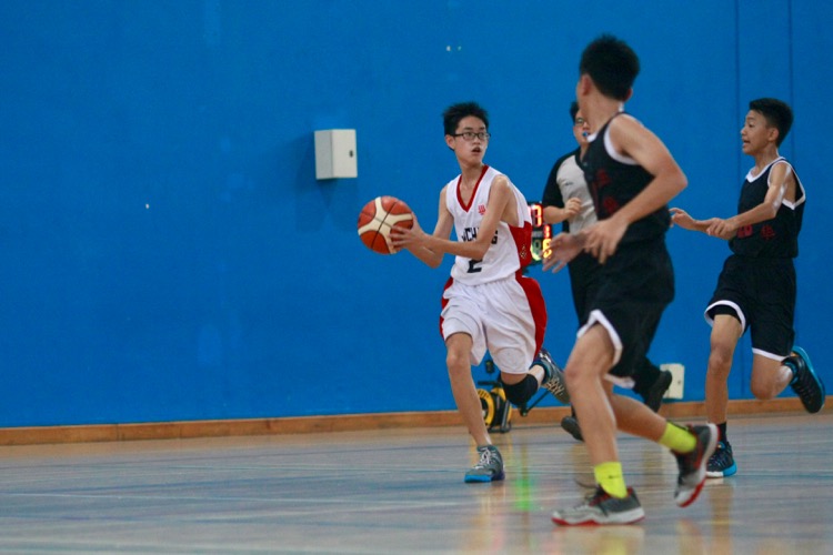 HCI (white) had a comfortable 82-8 win over Zhenghua to improve to a 2-0 win-loss record. (Photo © Les Tan/Red Sports)