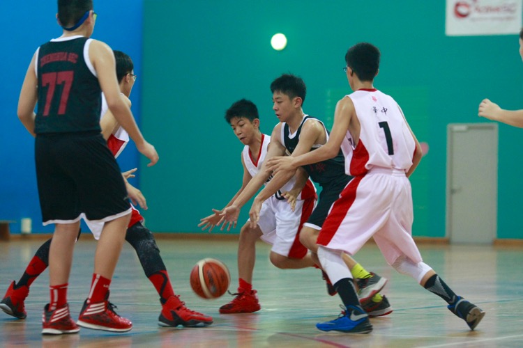 HCI (white) had a comfortable 82-8 win over Zhenghua to improve to a 2-0 win-loss record. (Photo © Les Tan/Red Sports)