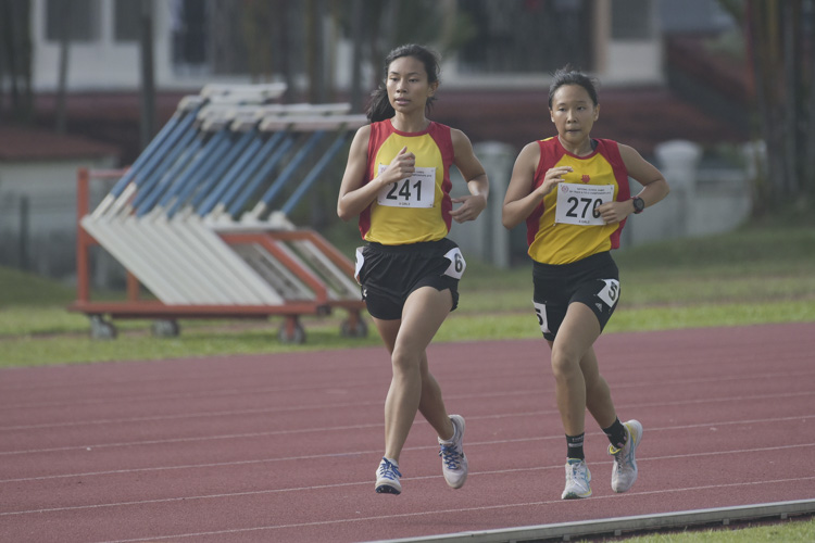 HCI's Arissa Rashid (#241) pulling away from the pack with teammate Vera Wah (#270) in the National A Division Girls 1500m race with a time of 05:13.12. (Photo © Stefanus Ian)