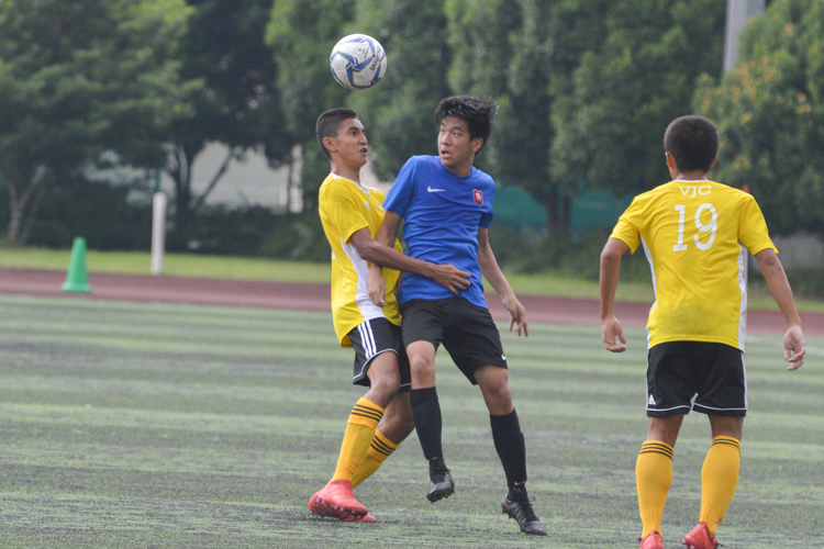 Players from both sides engage in an aerial battle to win the ball. (Photo 13 © REDintern Nathiyaah Sakthimogan)